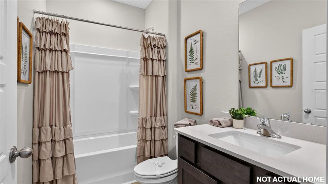 Furnished interior view inside a new home in Sawmill Branch, Palm Coast (Image 28).