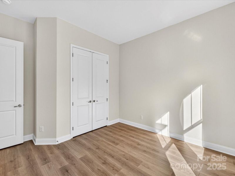 Spacious, unfurnished interior of a new home in Encore at Streamside - Tradition Series, Waxhaw (Image 35).