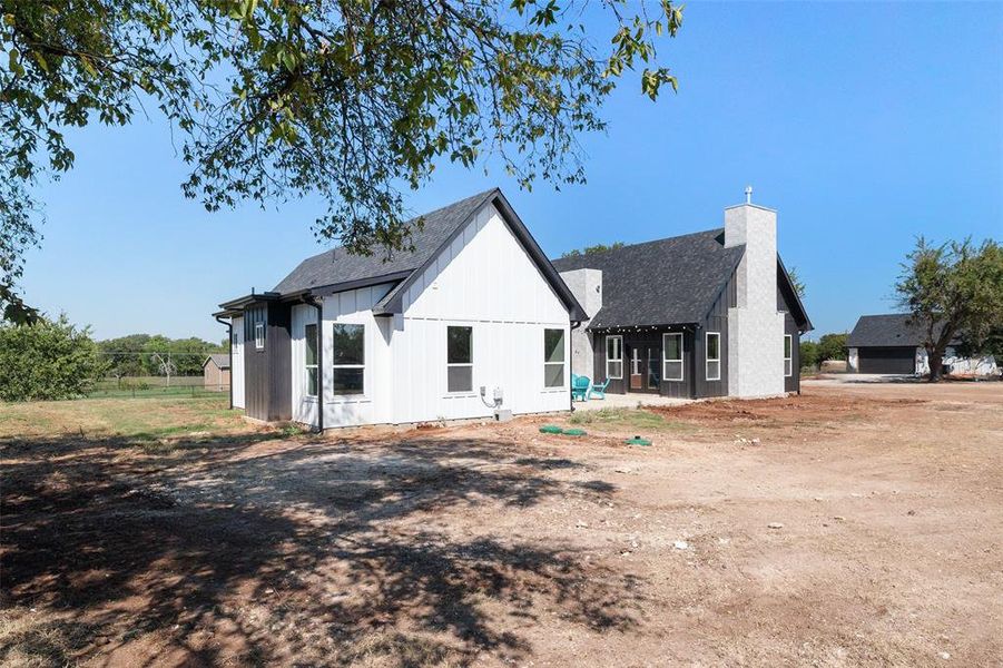 Front exterior of a new home in , Joshua, TX, highlighting curb appeal (Image 25). Front exterior of a new home in , Joshua, TX, highlighting curb appeal (Image 25).