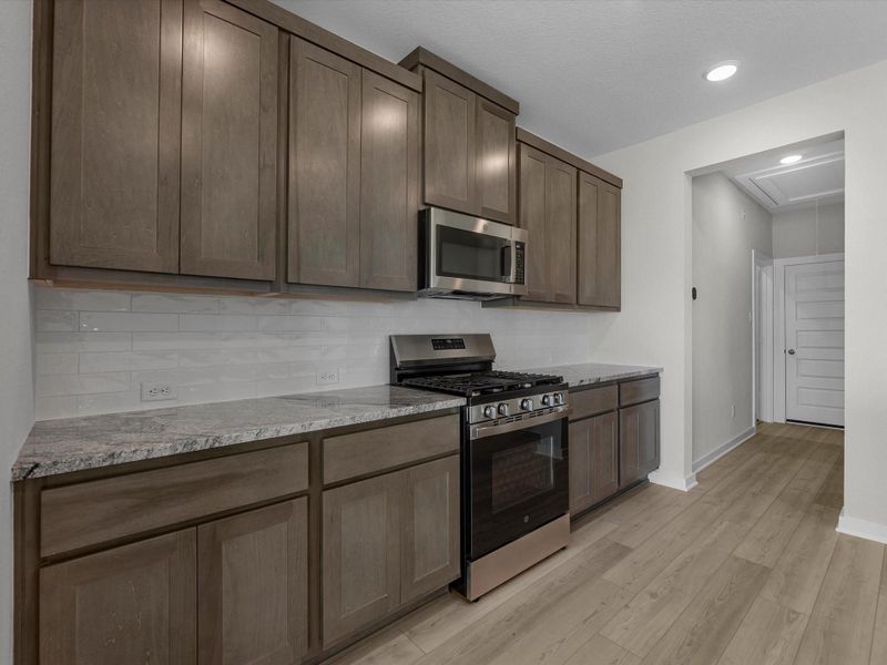 Furnished interior view inside a new home in Mason Woods, Cypress (Image 10).