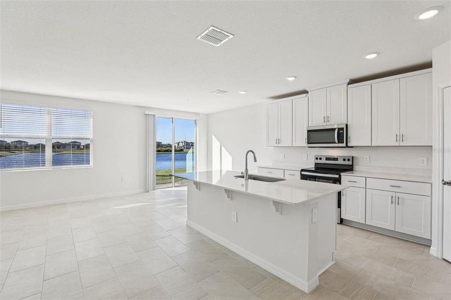 Furnished interior view inside a new home in Lake Deer Estates - Signature Series, Poinciana (Image 10).
