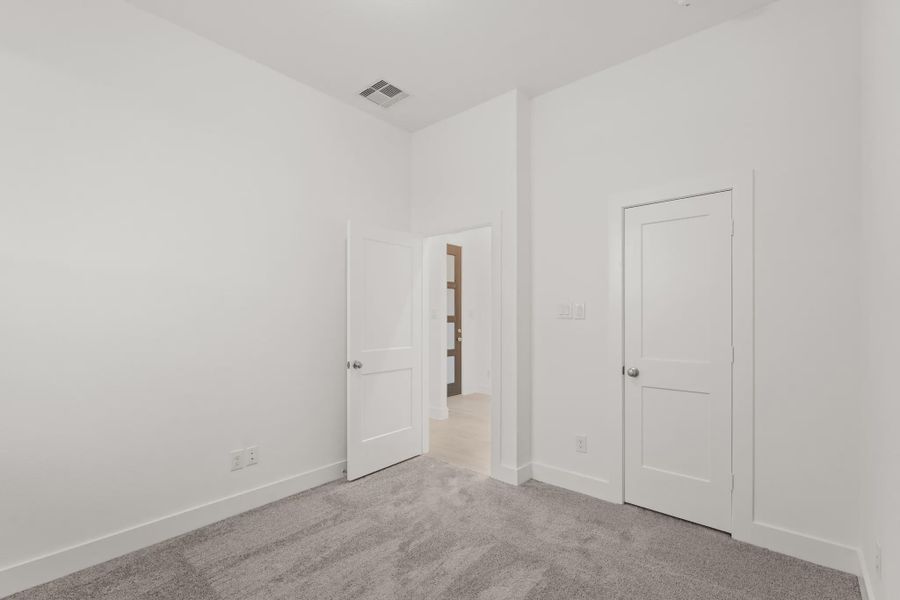 Representative unfurnished interior of a home built from the Fairway by Chesmar Homes in Riceland Alley Loads, Mont Belvieu (Image 13).