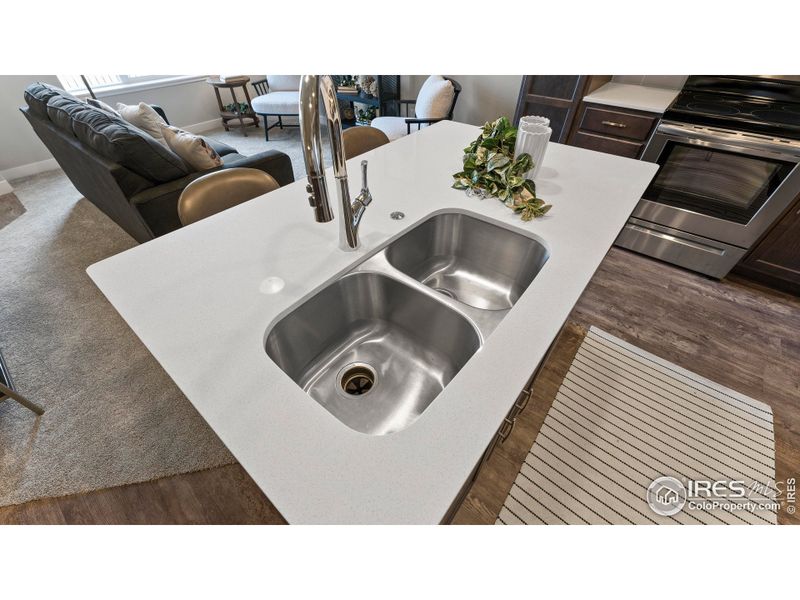 Kitchen - photos not of actual unit - finishes may vary Kitchen - photos not of actual unit - finishes may vary