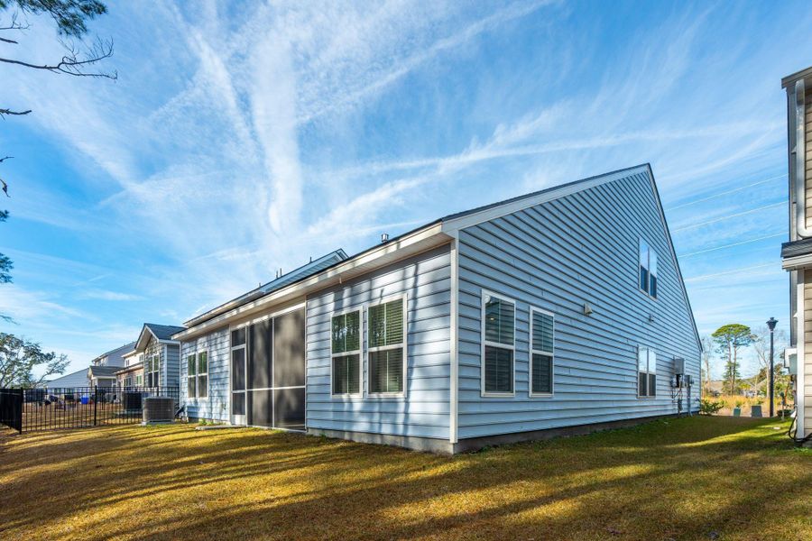 Exterior details and patio area of a home in Saint John's Lake: Arbor Collection, Johns Island (Image 26).