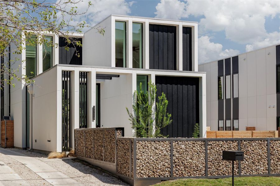 Front exterior of a new home in , Austin, TX, highlighting curb appeal (Image 1).