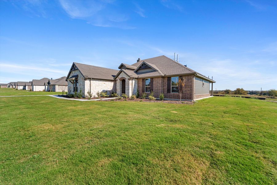 Front exterior of a new home in Parker Heights, Valley View, TX, highlighting curb appeal (Image 25). Front exterior of a new home in Parker Heights, Valley View, TX, highlighting curb appeal (Image 25).