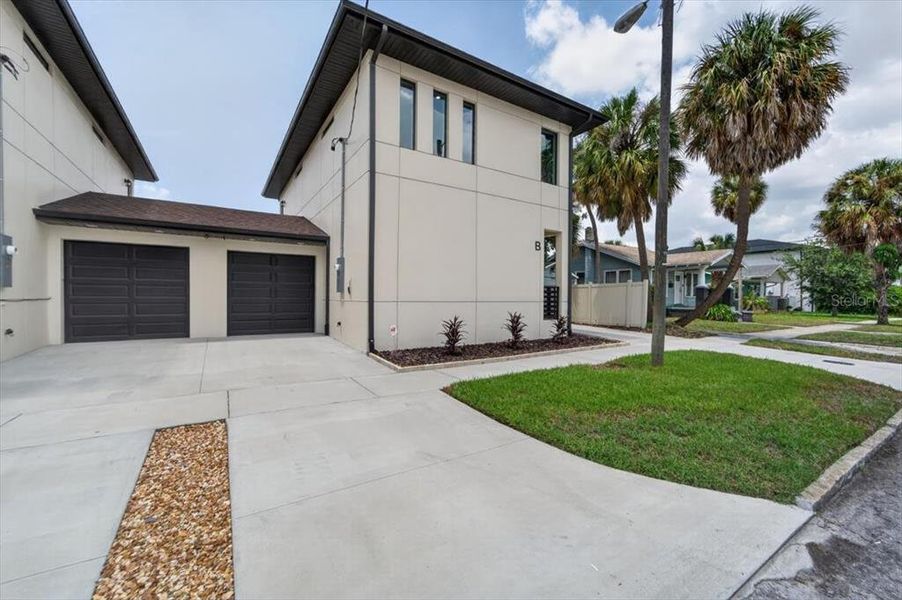 Front exterior of a new home in , Tampa, FL, highlighting curb appeal (Image 31).