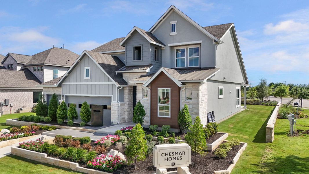 Front exterior of a new home in Lariat, Liberty Hill, TX, highlighting curb appeal (Image 25).