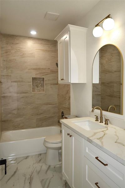 The second full bathroom features a shower-tub combo, quartz countertops, and additional storage. The second full bathroom features a shower-tub combo, quartz countertops, and additional storage.