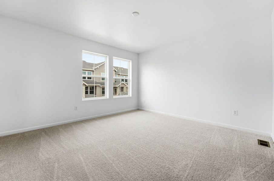 Spacious, unfurnished interior of a new home in Trailstone, Arvada (Image 29).