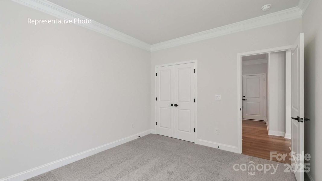 Spacious, unfurnished interior of a new home in Sanctuary at Southgate, Indian Trail (Image 21).