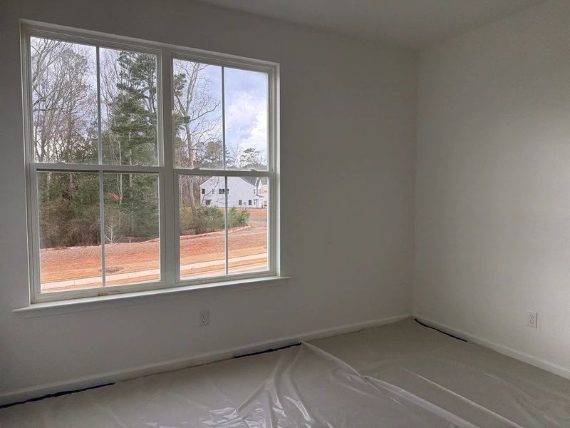 In-progress construction of a new home in Rowland's Grant, Fuquay Varina, NC (Image 27).