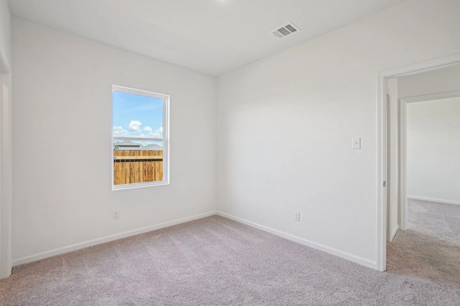 Representative unfurnished interior of a home built from the Odyssey by Starlight Homes in Williams Landing, Waller (Image 16).