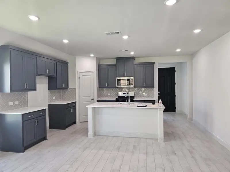 Furnished interior view inside a new home in , Anna (Image 11).