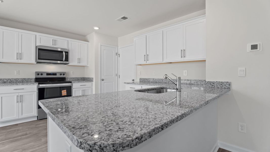 Furnished interior view inside a new home in Jetstream Park, Wilson (Image 4).