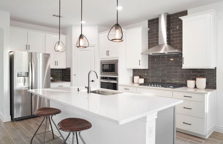 Bright and Open Kitchen with Built In Appliances