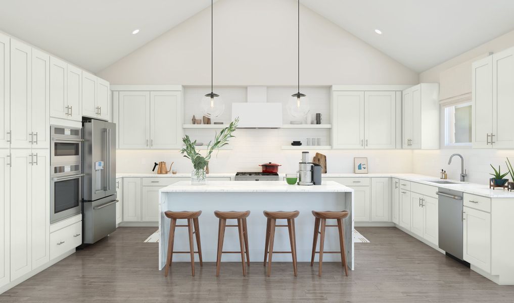 Kitchen with vaulted ceiling and pendant lighting