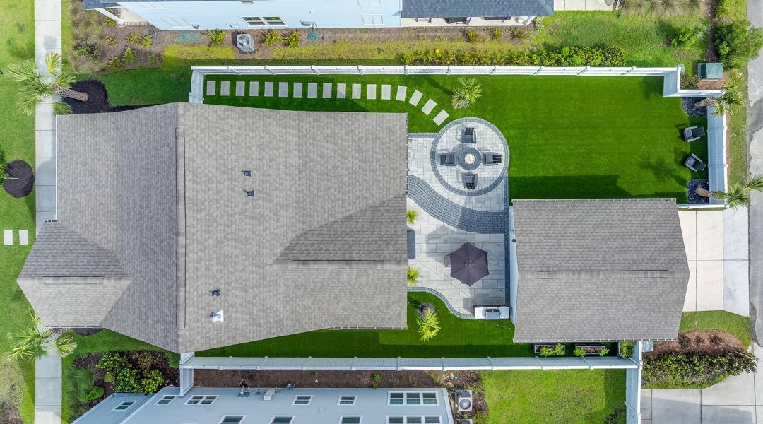 Front exterior of a new home in Nexton, Summerville, SC, highlighting curb appeal (Image 23). Front exterior of a new home in Nexton, Summerville, SC, highlighting curb appeal (Image 23).