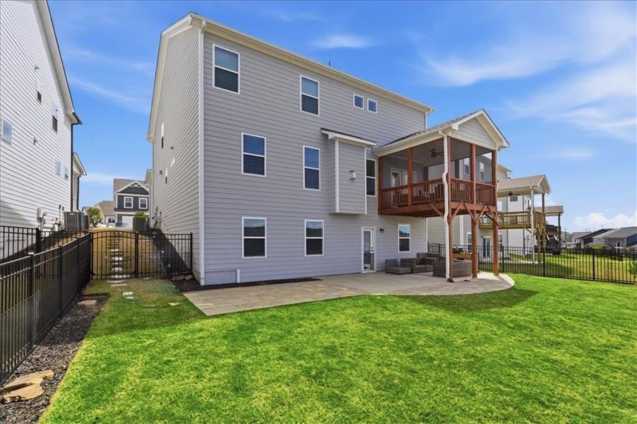 Exterior details and patio area of a home in , Hoschton (Image 24).