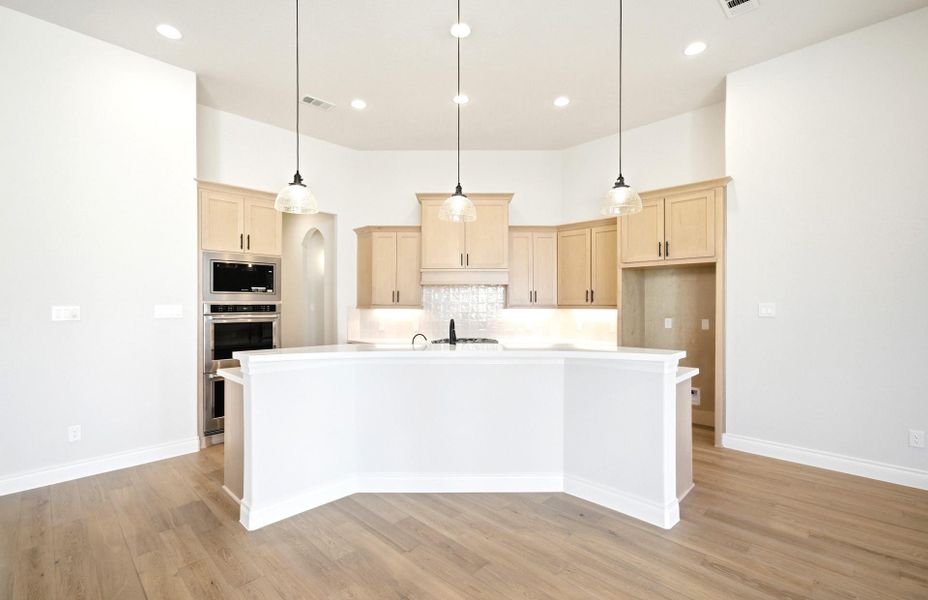 Furnished interior view inside a new home in Bridgeland 60′, Cypress (Image 10).