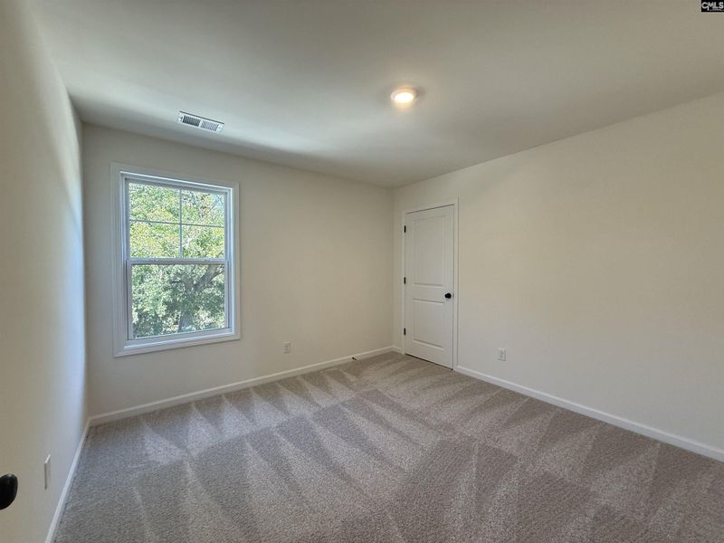 Spacious, unfurnished interior of a new home in Dunbar Village, Cayce (Image 34).