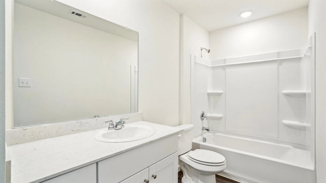 Representative furnished interior of a home built from the Jupiter by Starlight Homes in Castlewood South, Taylor (Image 11). Representative furnished interior of a home built from the Jupiter by Starlight Homes in Castlewood South, Taylor (Image 11).