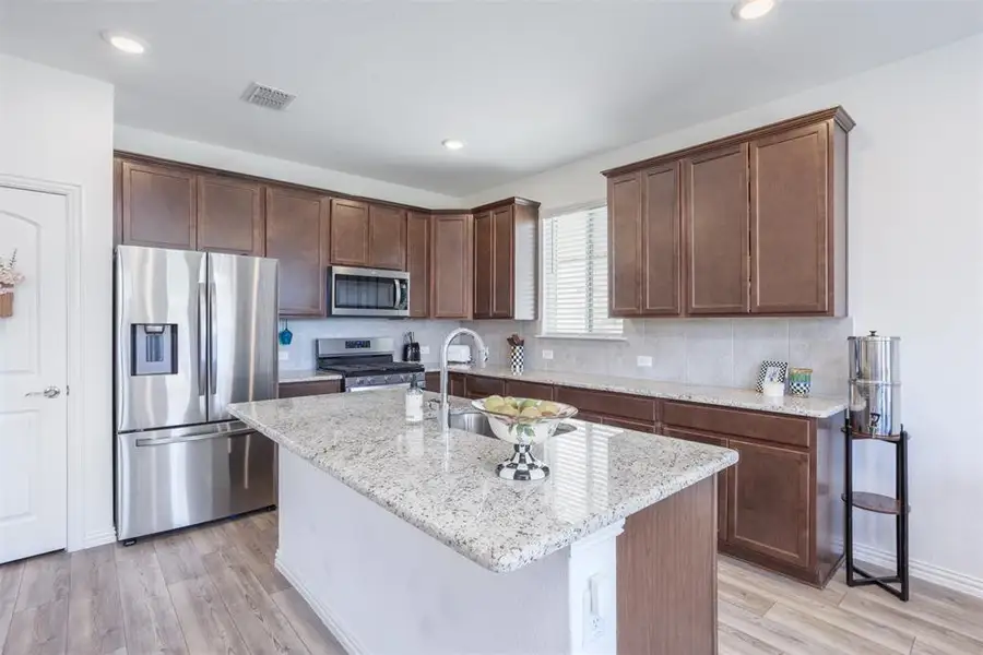 Furnished interior view inside a new home in , Anna (Image 12). Furnished interior view inside a new home in , Anna (Image 12).