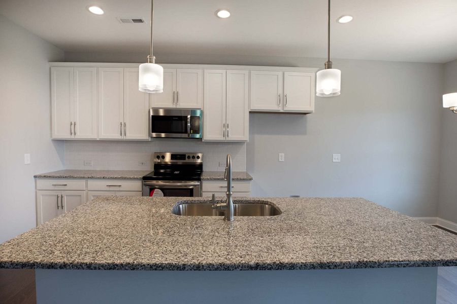 Representative furnished interior of a home built from the Clayton by Caviness & Cates Communities in Bartlett Manor, Youngsville (Image 169).