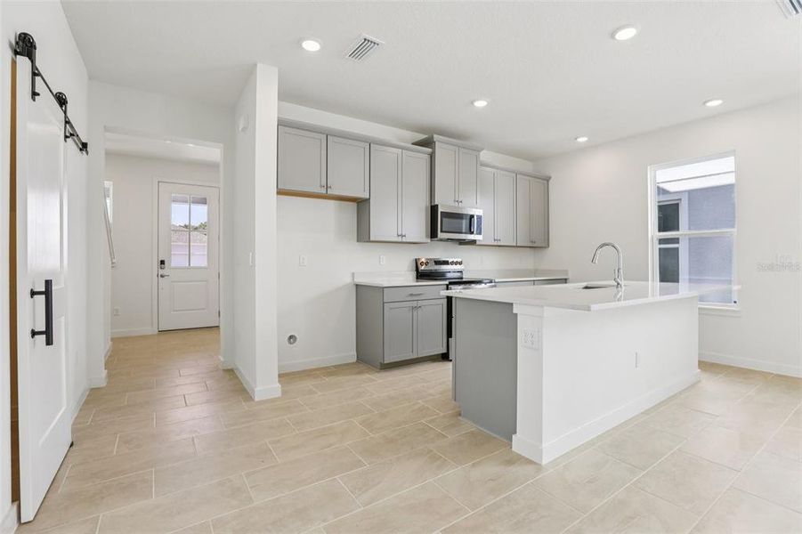 Furnished interior view inside a new home in Trinity Place, St. Cloud (Image 11).