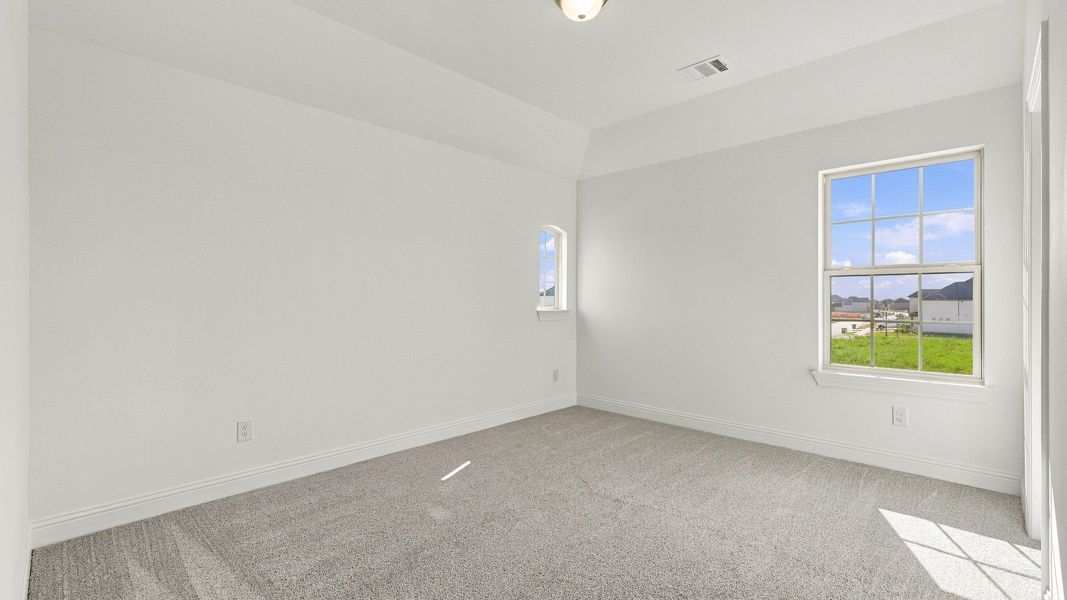 Furnished interior view inside a new home in Green Meadows Classic, Celina (Image 30).