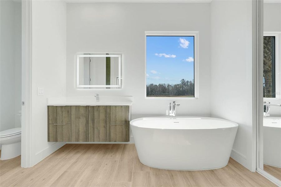 Furnished interior view inside a new home in Hampton Green at Providence, Davenport (Image 10).