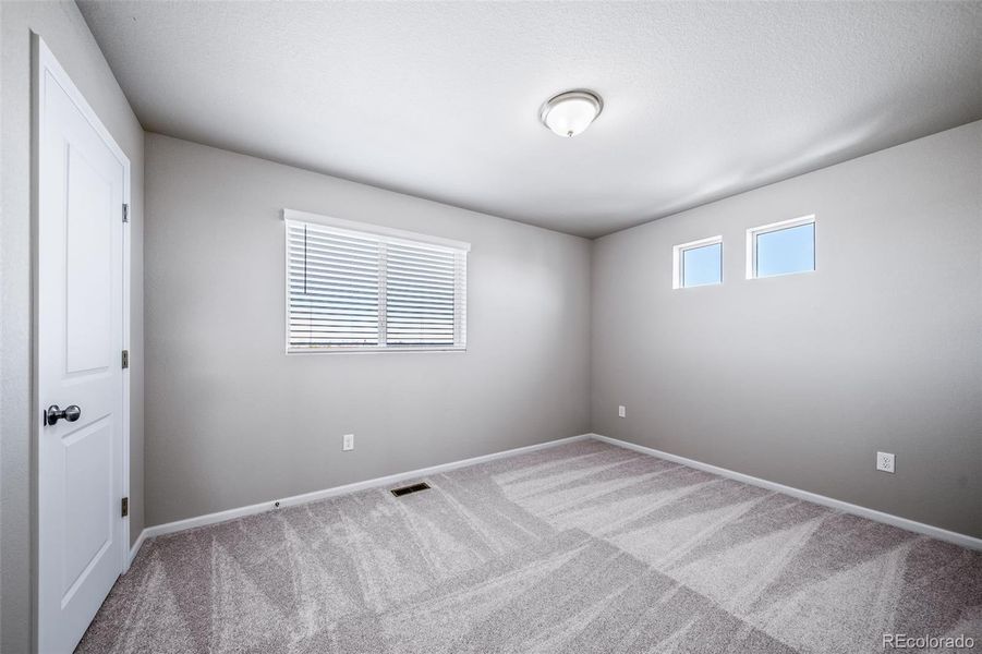 Spacious, unfurnished interior of a new home in Muegge Farms, Bennett (Image 22).