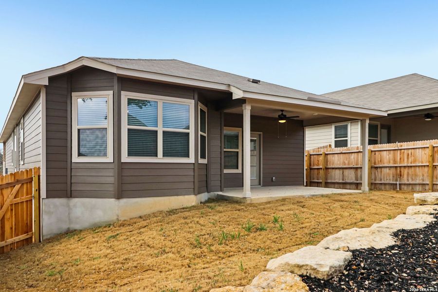 Exterior details and patio area of a home in Scenic Crest - Premier Series, Boerne (Image 3). Exterior details and patio area of a home in Scenic Crest - Premier Series, Boerne (Image 3).