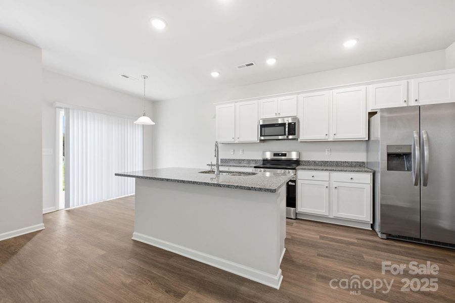 Furnished interior view inside a new home in , Statesville (Image 6).