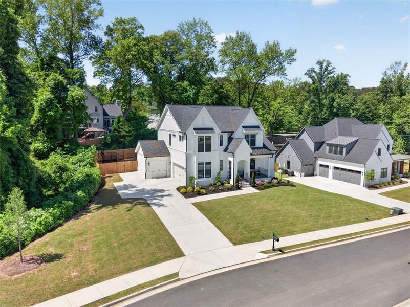 Front exterior of a new home in Town Farms, Peachtree Corners, GA, highlighting curb appeal (Image 32).
