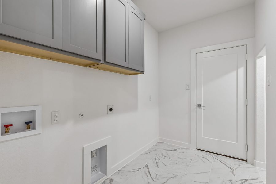 Utility Room in the Claret home plan by Trophy Signature Homes – REPRESENTATIVE PHOTO