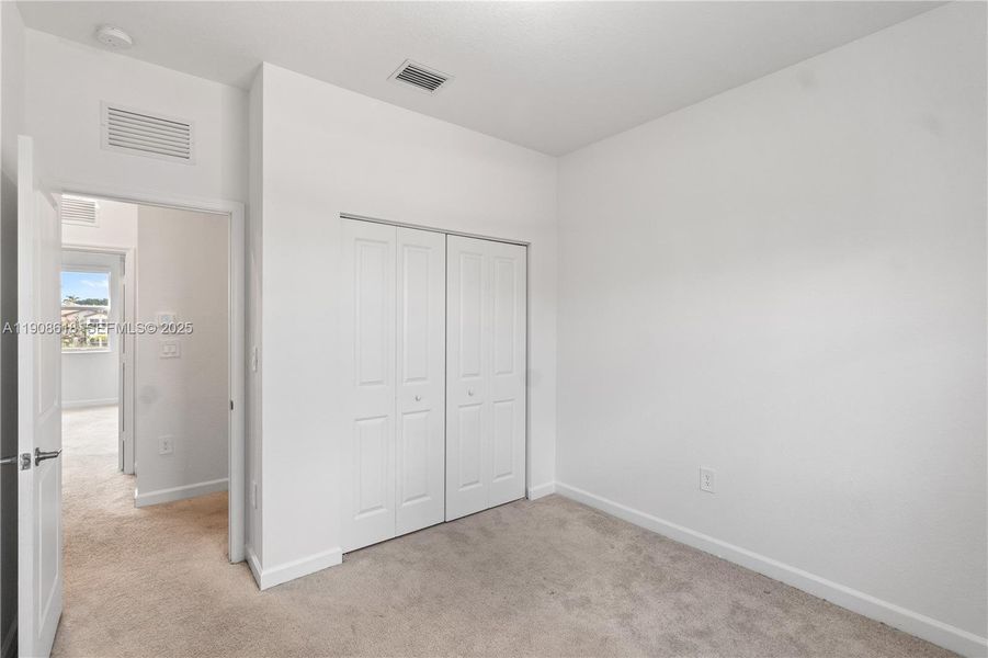 Spacious, unfurnished interior of a new home in Harmony Parc, Homestead (Image 24).