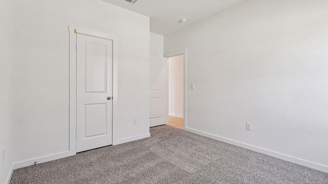 Spacious, unfurnished interior of a new home in Monarch Ranch, Manor (Image 14).