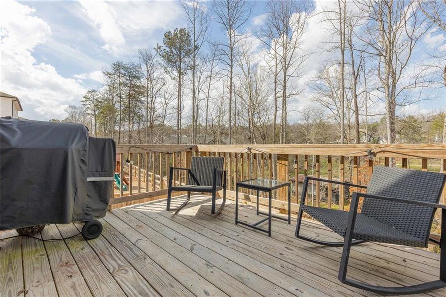 Exterior details and patio area of a home in Creekside at Farmers Crossing, Ball Ground (Image 26).