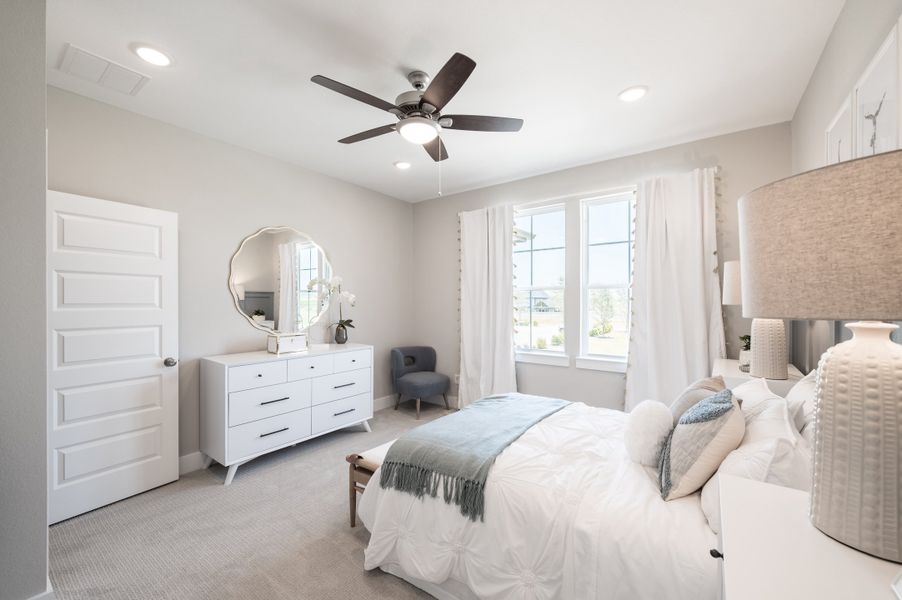 Representative furnished interior of a home built from the Verdin by Tri Pointe Homes in Pecan Ridge, Fulshear (Image 18).