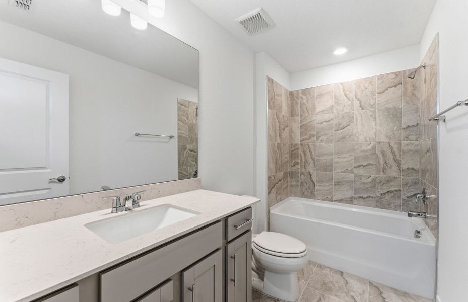 Furnished interior view inside a new home in Oakfield Trails, Parrish (Image 5).
