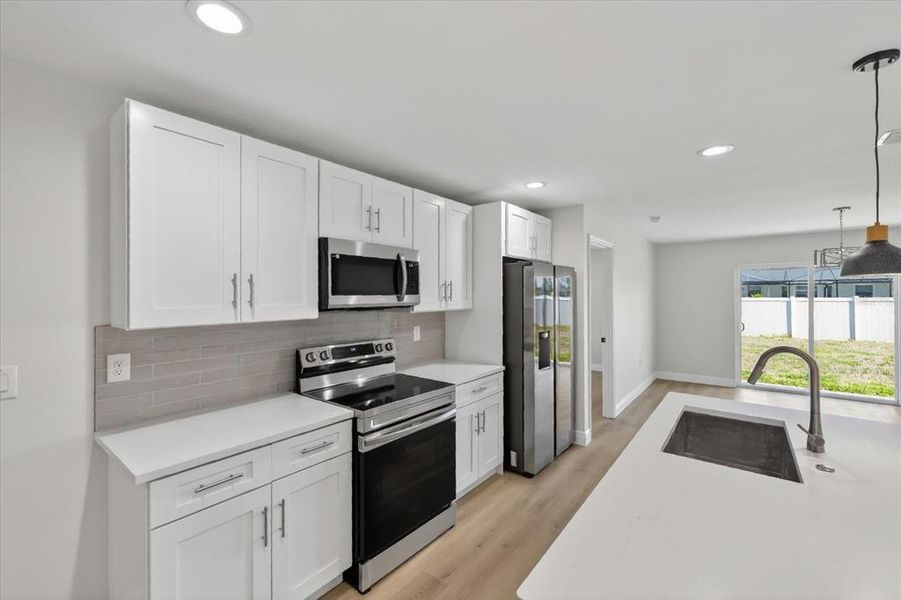 Furnished interior view inside a new home in , Port Charlotte (Image 6).