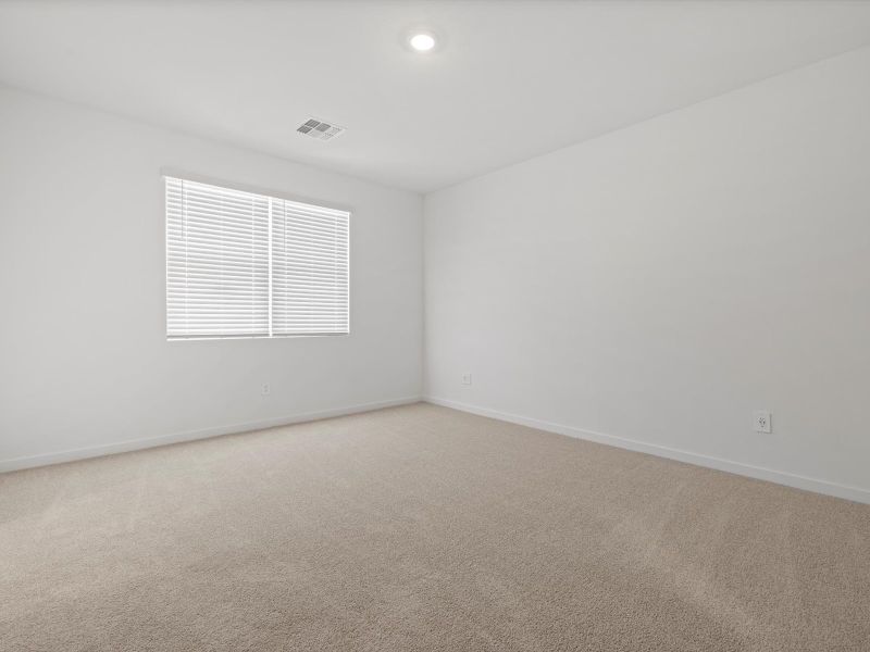 Spacious, unfurnished interior of a new home in Rancho Mirage Estate Series, Maricopa (Image 12).