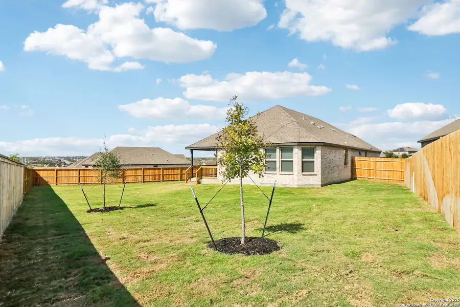 Exterior details and patio area of a home in Arcadia Ridge - Premier Series, San Antonio (Image 4). Exterior details and patio area of a home in Arcadia Ridge - Premier Series, San Antonio (Image 4).