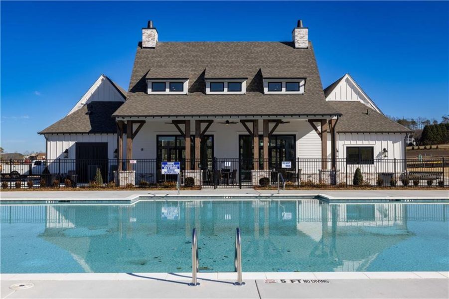 Front exterior of a new home in Promenade at Sawnee Village, Cumming, GA, highlighting curb appeal (Image 1).