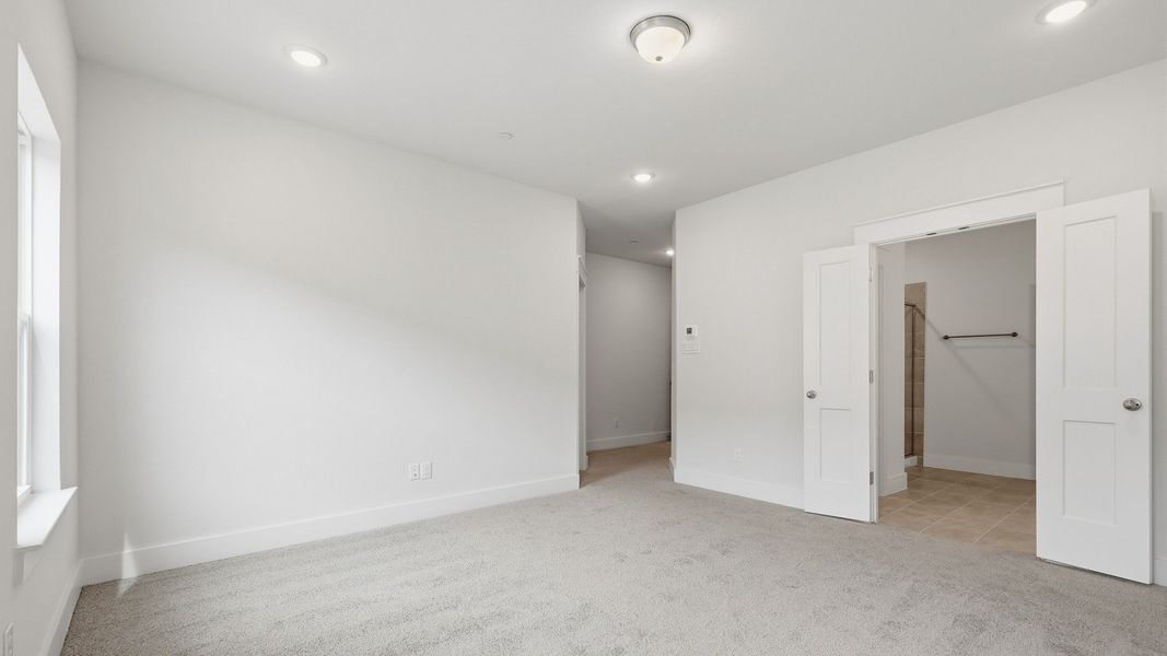 Furnished interior view inside a new home in Collin Creek, Plano (Image 40).
