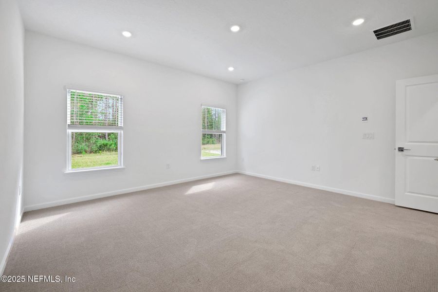 Spacious, unfurnished interior of a new home in Brook Forest, St. Augustine (Image 32).