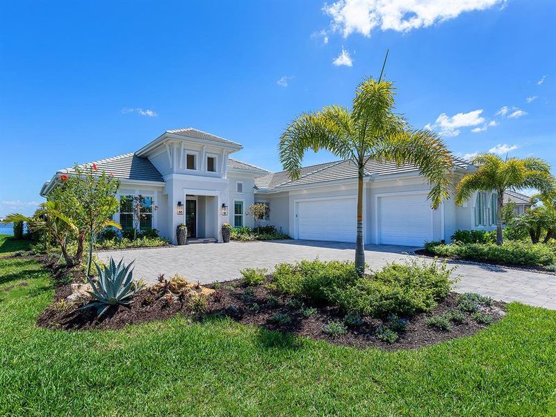 Front exterior of a new home in , Sarasota, FL, highlighting curb appeal (Image 23).