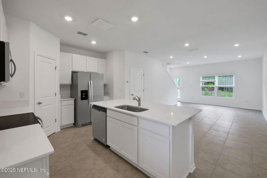 Furnished interior view inside a new home in Atlantis Pointe, Middleburg (Image 9).