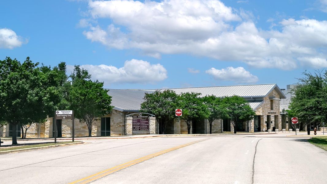 Front exterior of a new home in Parten 65', Austin, TX, highlighting curb appeal (Image 10). Front exterior of a new home in Parten 65', Austin, TX, highlighting curb appeal (Image 10).